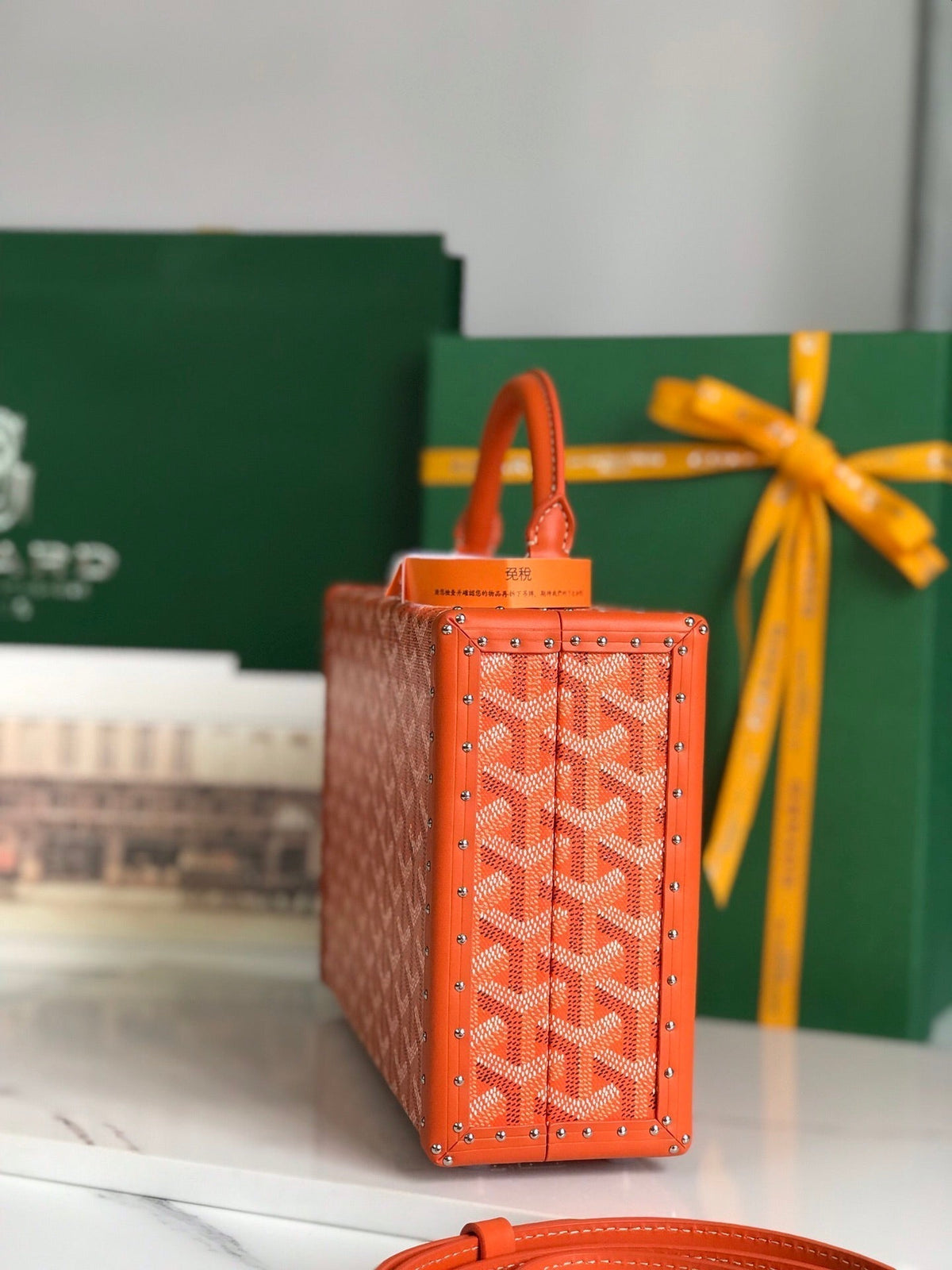GRAND HÔTEL TRUNK BAG 24 IN ORANGE GOYARDINE CANVAS AND CALFSKIN