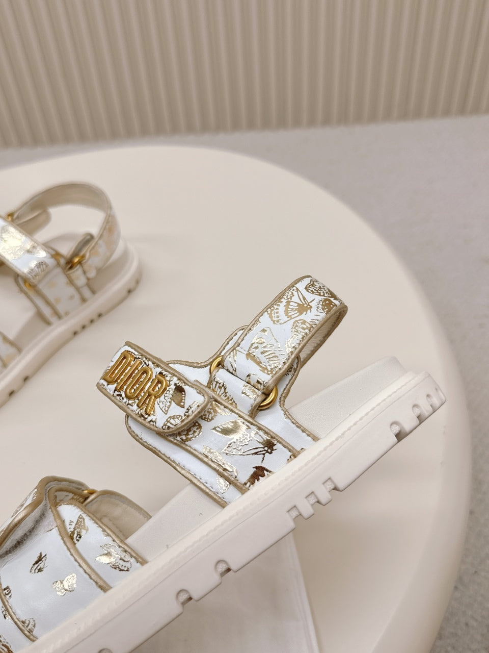 DIOR BACK-STRAP SANDALS 25S IN CREAM WHITE AND GOLD CALFSKIN WITH BUTTERFLY MOTIF