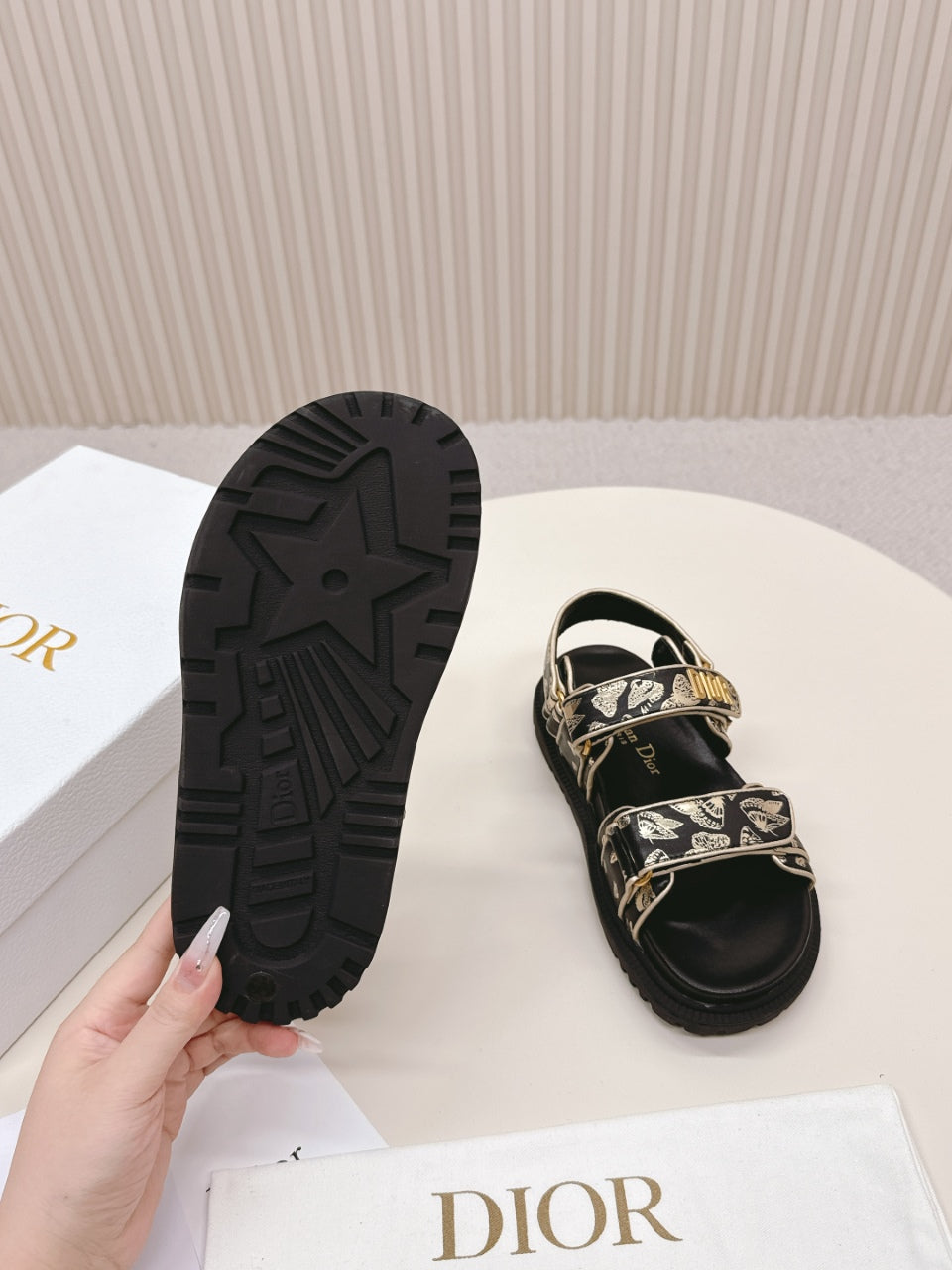 DIOR BACK-STRAP SANDALS 25S IN BLACK AND GOLD CALFSKIN WITH BUTTERFLY MOTIF