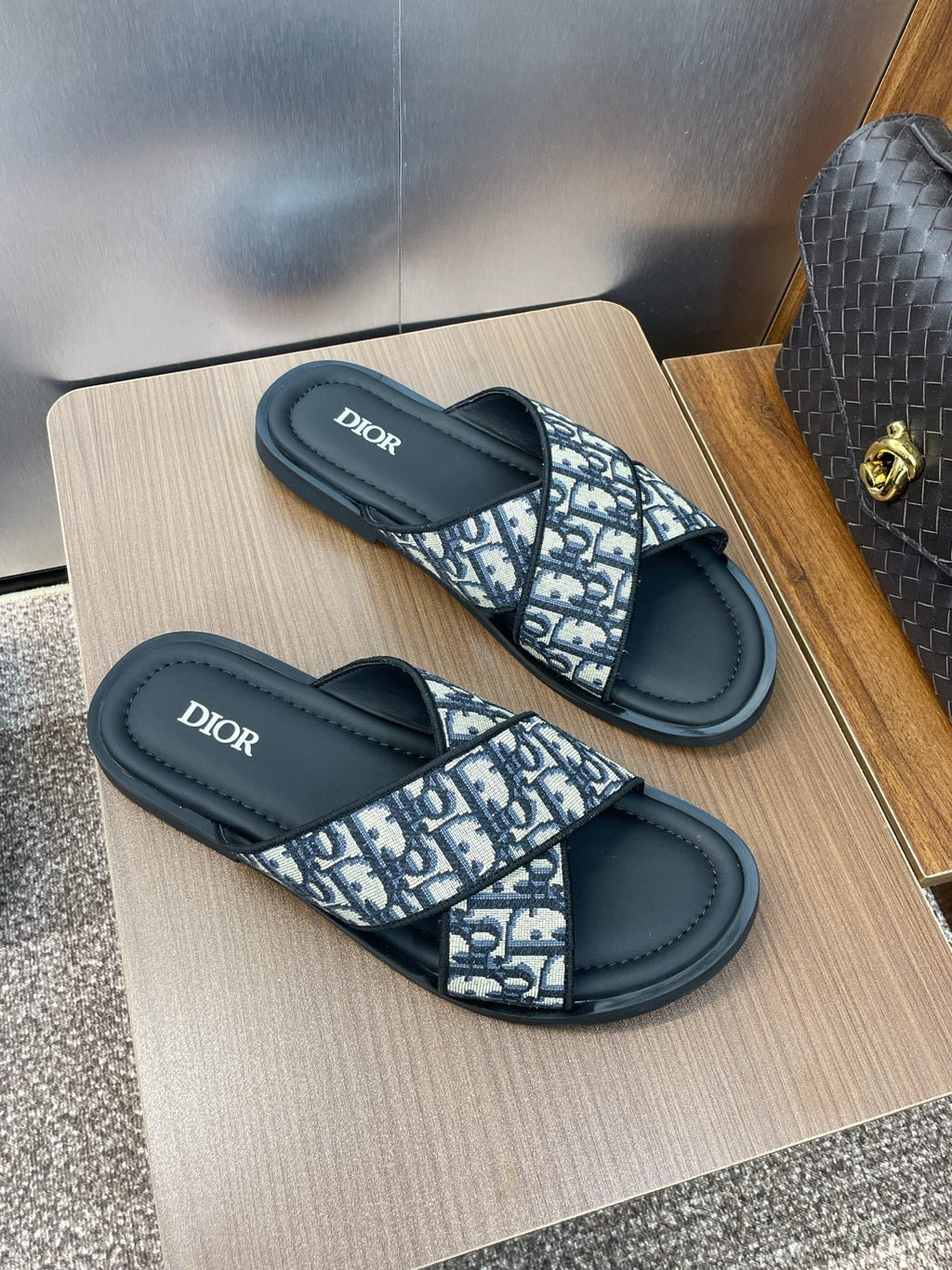 DIOR 25S ALIAS CROSS-STRAP SLIDES IN BLACK CALFSKIN WITH CD OBLIQUE DEEP BLUE LOGO